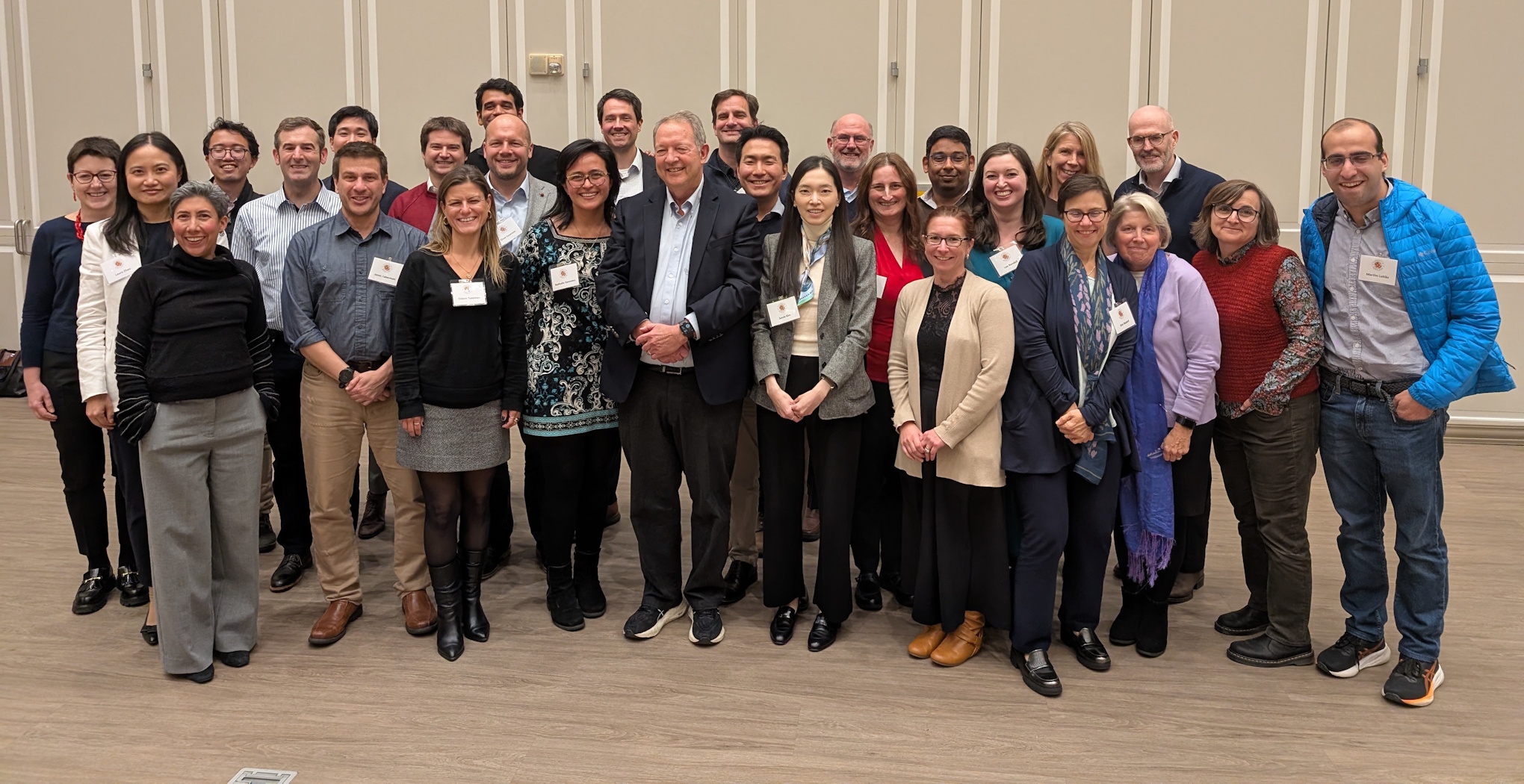 a group photo of the attendees of professor john haltiwanger's conference