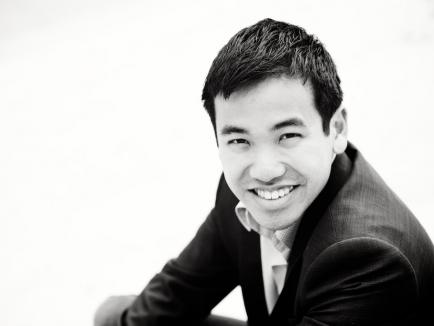 George Zuo smiling, profile view