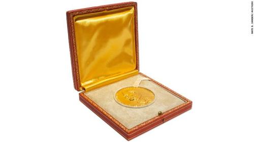 Nobel Prize medallion in a red case