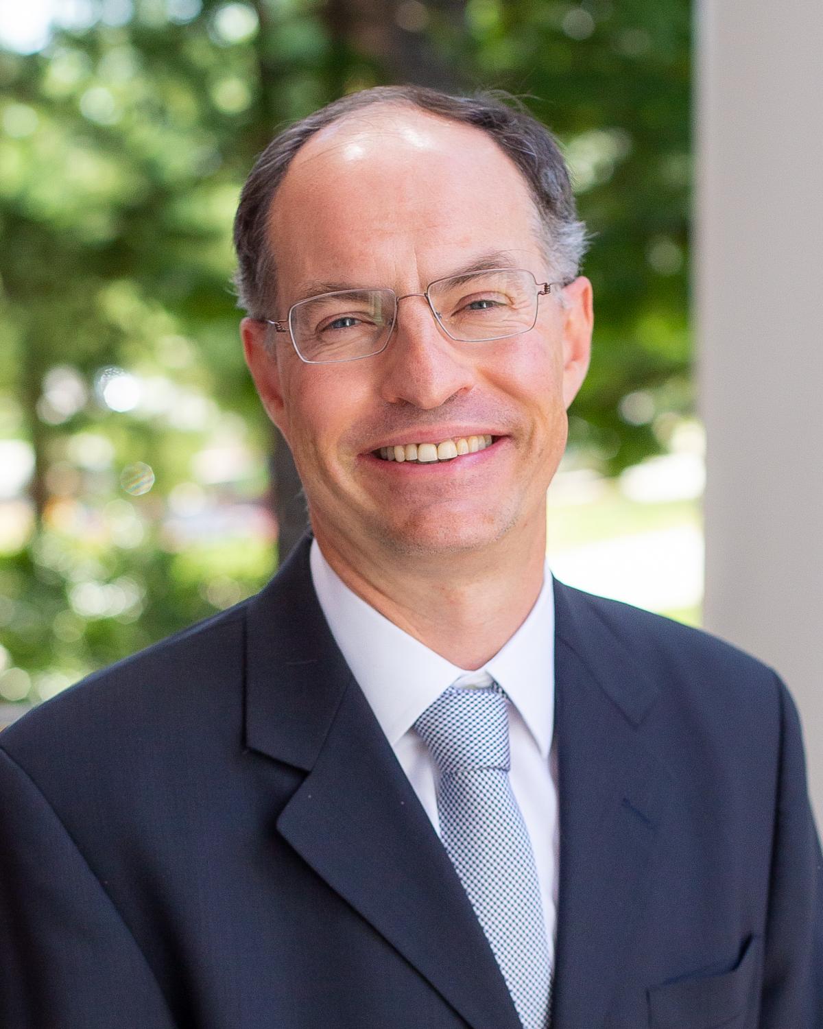 front photo of department of economics chair andrew sweeting